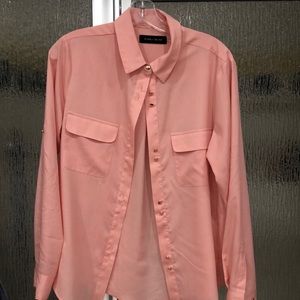 Ivanka Trump apricot blouse with gold buttons